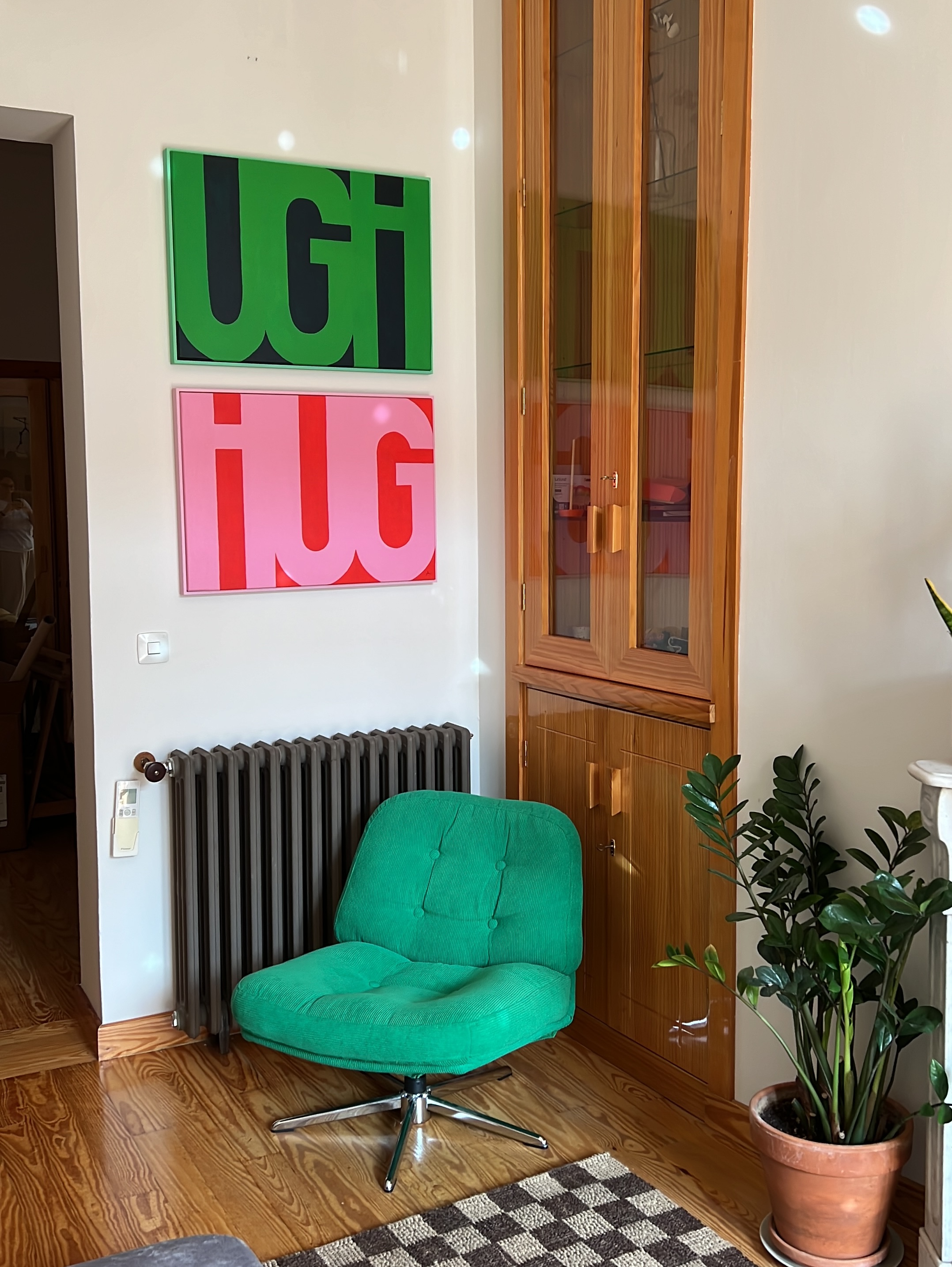 UGH HUG painting by Ariana Escobar in living room